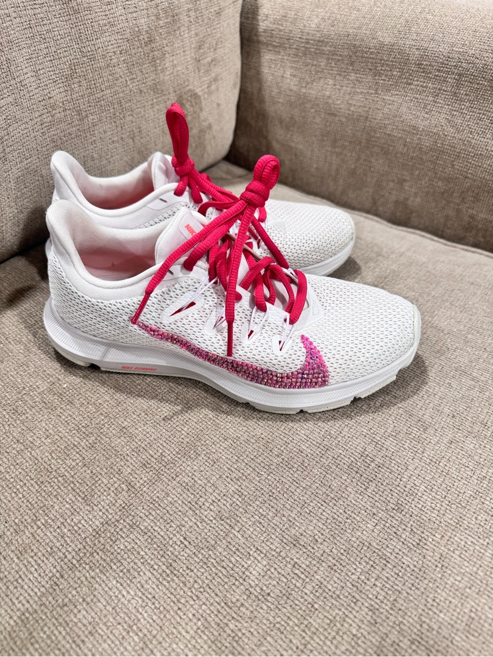 Nike Women's White Running Sneakers with Hot Pink Details